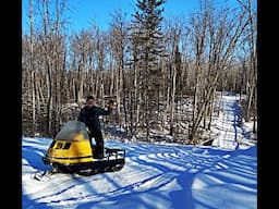 Making Our Winter Logging Trail Using An Old Ski Doo Alpine.