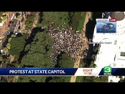 Hundreds protest President Donald Trump's policies at California Capitol