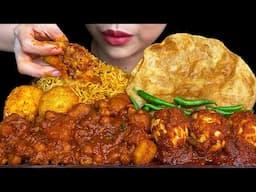 INDIAN FOOD\\EGG BIRYANI, SPICY BOILED CHICKEN EGG, PURI, POTATO WITH CHICKPEAS CURRY