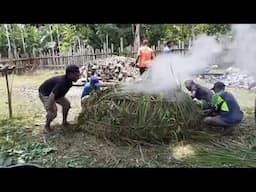 TRADISI BAKAR BATU DARI SUKU PEGUNUNGAN YANG ADA DI KABUPATEN KEEROM