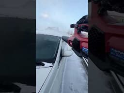 Leaf blower tackles light snow