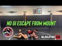 Mount escape for No Gi and MMA