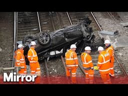 Major train line blocked after car crashed on to tracks