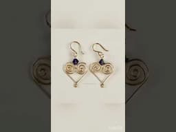 Spiral heart earrings made with @beadalon German-style wire. #wireearrings #earringmaking