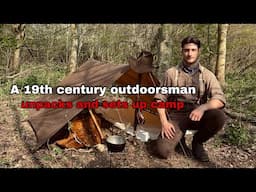 A 19th century outdoorsman unpacks and sets up camp