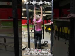 How to do a Static Ring Neutral Grip Pull-up. Pull with no jump, pause at top, lower under control.