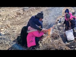 The difficult conditions of a mother and daughter in the mountains without shelter