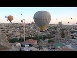 Admiring Hot Air Balloons Drifting Over Cappadocia Turkey