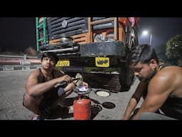 Truck Drivers Cooking on Road