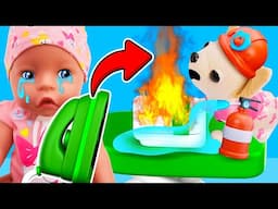 The toy dog broke the iron! The baby doll and the nanny are ironing clothes. Toys videos for kids.