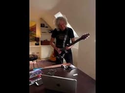 Brian May Playjng BMG Red Special Guitar