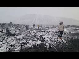 Deep cracks and fissures in the lava in Nátthagi valley, going 3 meters down. Winter storm. 04.02.25