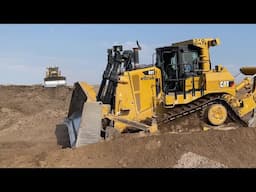 Two Caterpillar D9T Bulldozers Levelling An Old Mining Area