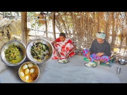 Santali tribe poor family cooking and eating Egg vapa, shak vaji and karela vorta