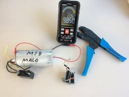 Cómo reparar un capacitor de aire acondicionado dual 80+10, el de 10 UF no funciona