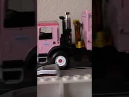 Pink Parris Truck Sales First Gear 1/34 Scale Side Loader Picking Up Trash #shorts