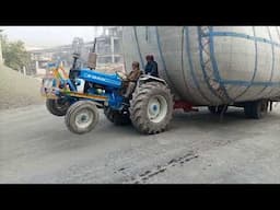 Dangerous driving practices. Overloading unsafe ride. Tractor drags heavy load Driving skills truck