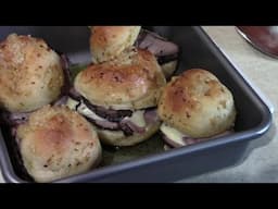 Garlic Knot Sliders with Roast Beef, Cheese and Horseradish Sauce