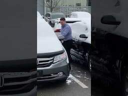 Typical car salesman! Too busy to put a coat on!