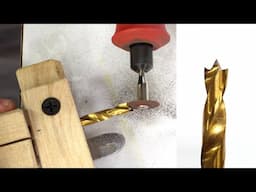 Grinding a brad point onto a metal drill bit