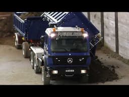 Mercedes SK 2633 tipps topsoil at the sieving plant