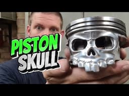 A piston carved into a skull, using a dremel.