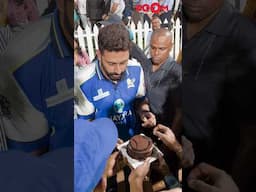 Abhishek Bachchan CUTS birthday cake with paps and fans' during a cricket match 😍 #abhishekhbachchan