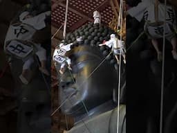 Japanese Cleaning the Massive Todaiji Statue in Nara