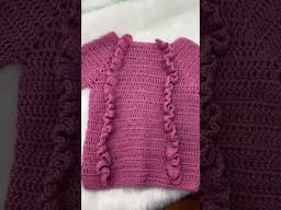 Suéter con olanes a crochet