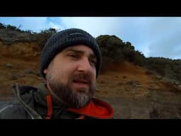 Looking for sharks teeth after a storm at Bawdsey, Suffolk.