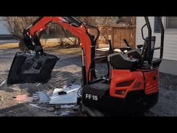 Smashing A TV With An Excavator