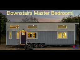 Downstairs master bedroom in this precious Tiny Home on Wheels