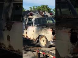 Hauling out a crusty Mercedes Ambulance from a scrapyard.