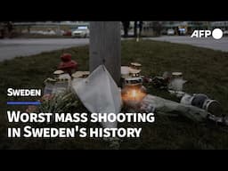 Flowers and candles lie by school day after Sweden mass shooting | AFP