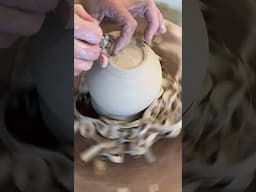 Trimming an elegant foot on a porcelain cup! #madewithclayshare #dct