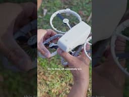 DJI Flip automatically turns on when you unfold the propellers and powers down when you close them