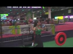 Alyssa Curtis shows off her skills at Super Bowl Experience