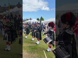 Lonach #pipeband #drumcorps playing Crossing the river Po during 2024 Aboyne #highlandgames #shorts