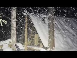 HIDE IN A COZY LOG CABIN FROM A HEAVY SNOWFALL. PREPARING LOGS FOR CONSTRUCTION