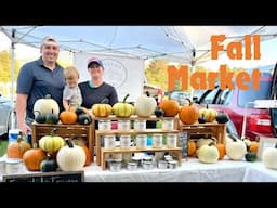 Selling Pumpkins and Candles at the Farmers Market on a Fall Day