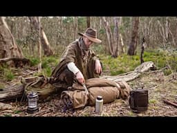 Solo Swagman Camp By A River In The Bush