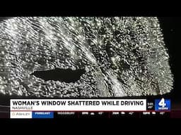 Woman's window shattered while driving