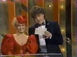 Tanya Tucker & Eddy Raven presenting award (MCN/TNN Awards 1986)