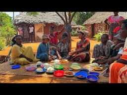 African village life/Cooking African cuisine,Roasted lemon herbs beef stew with vegetables and ugali