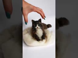 Needle felted cat sculpture.