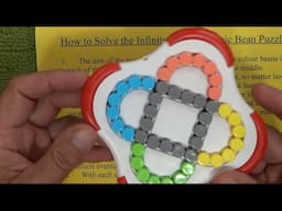 How to Solve the Infinity Spinner - Another Magic Bean RotatingPuzzle - Step by Step Tutorial