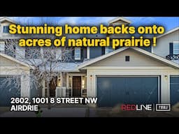 Stunning AIRDRIE home backs onto natural prairie reserve! Deanna McFarlane (Airdrie realtor)