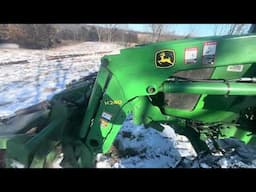 Cedar log loading and hauling is efficient with tractor grapples.