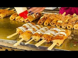 japanese street food - hashimaki okonomiyaki on a chopstick  箸巻き はしまき